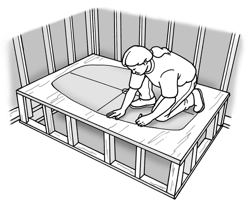 Figure 6-6: Laying out the outline of the tub so that it’s centered on the deck.